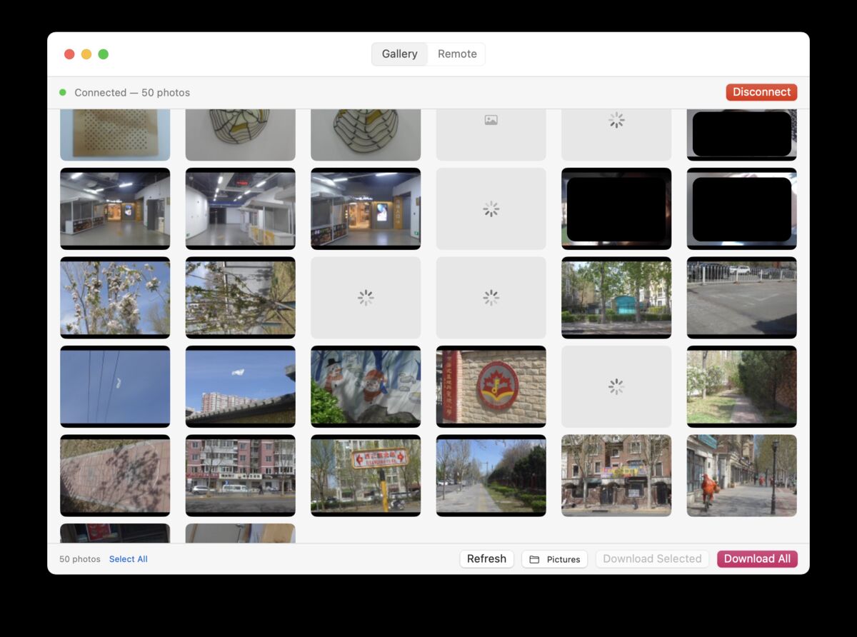 Mac app gallery with 50 photos loading