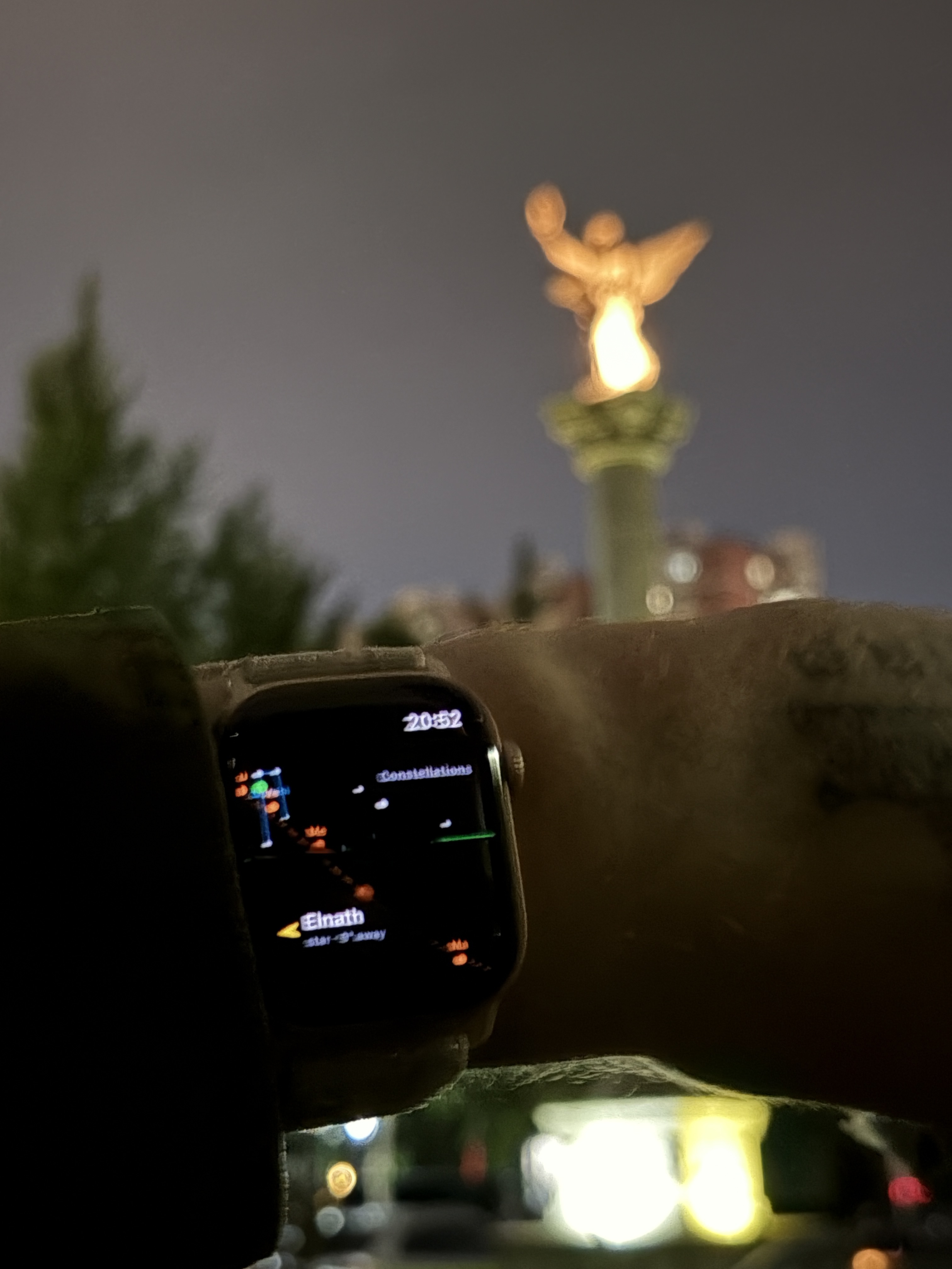 The watch in constellations mode, with star labels including Elnath